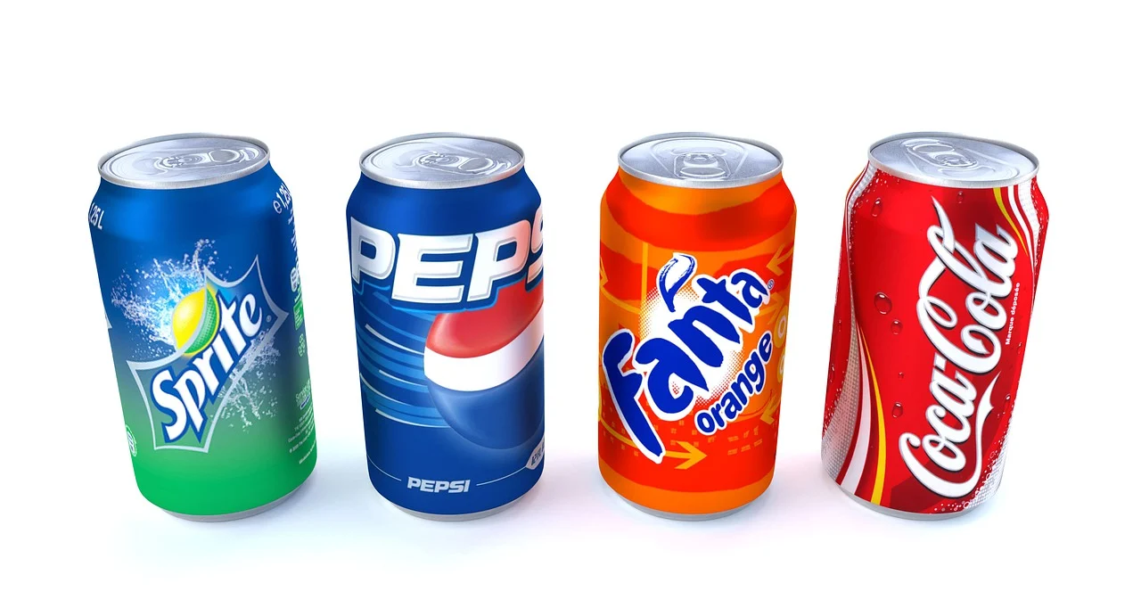 four cans of pop or soda